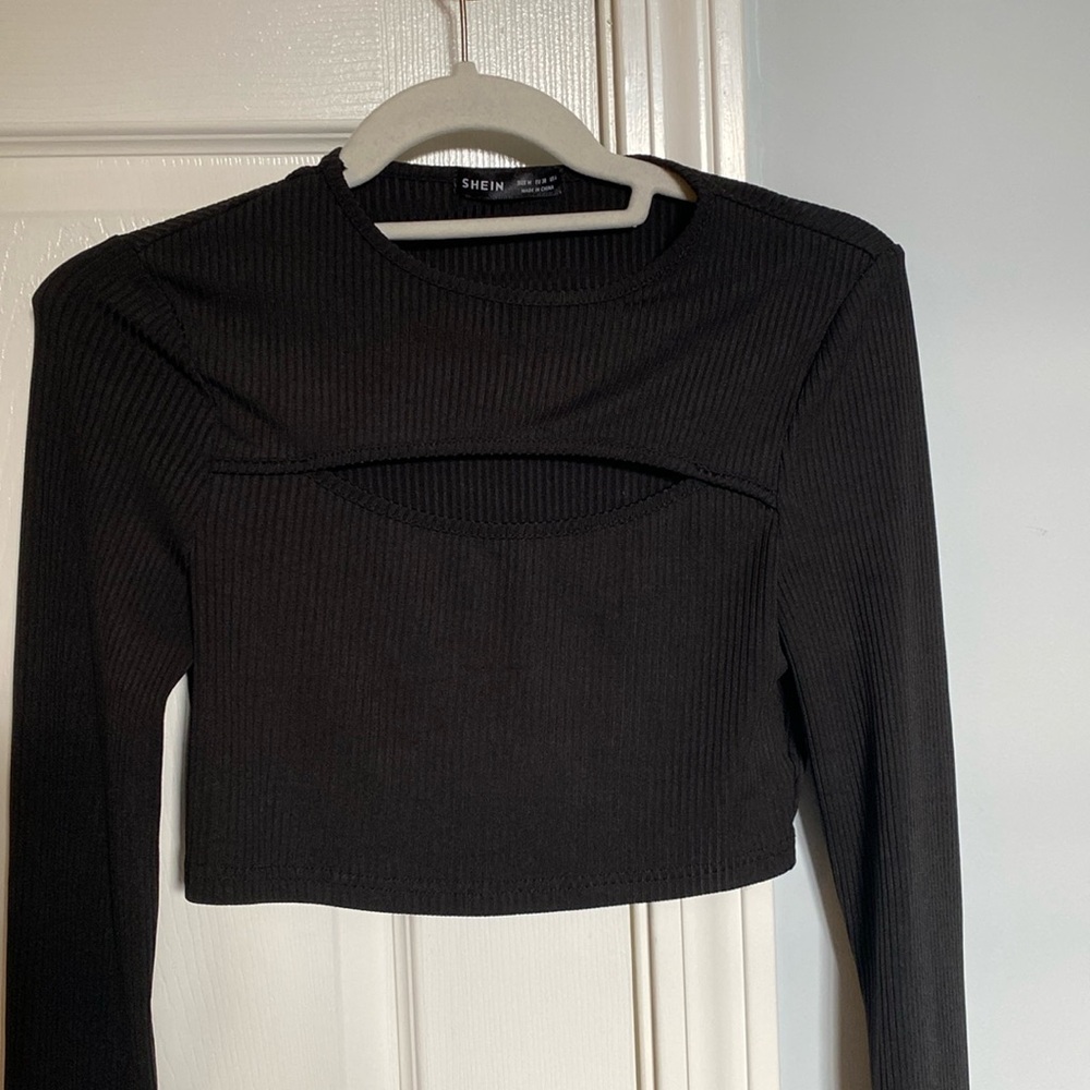 Cropped going out top